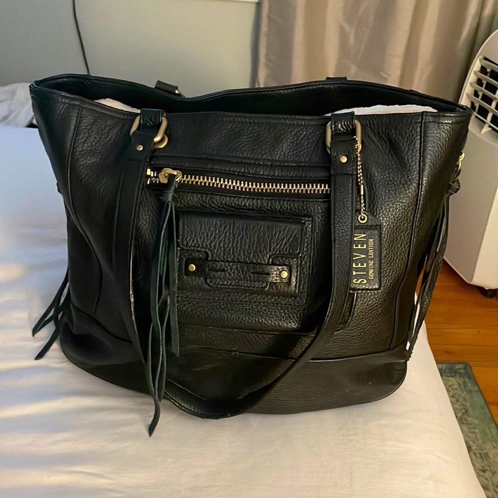 STEVEN by Steve Madden Black Leather Handbag with Gold Details and Tassles